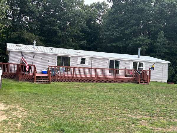 4 Acres of Land with Home for Sale in Walkerville, Michigan
