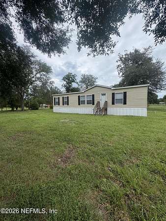 2.28 Acres of Land with Home for Sale in Hilliard, Florida