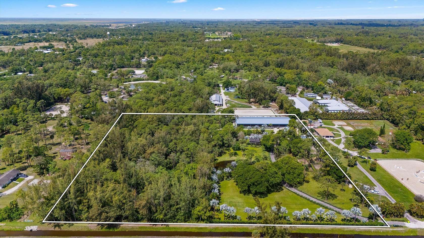 10 Acres of Land with Home for Sale in Loxahatchee Groves, Florida