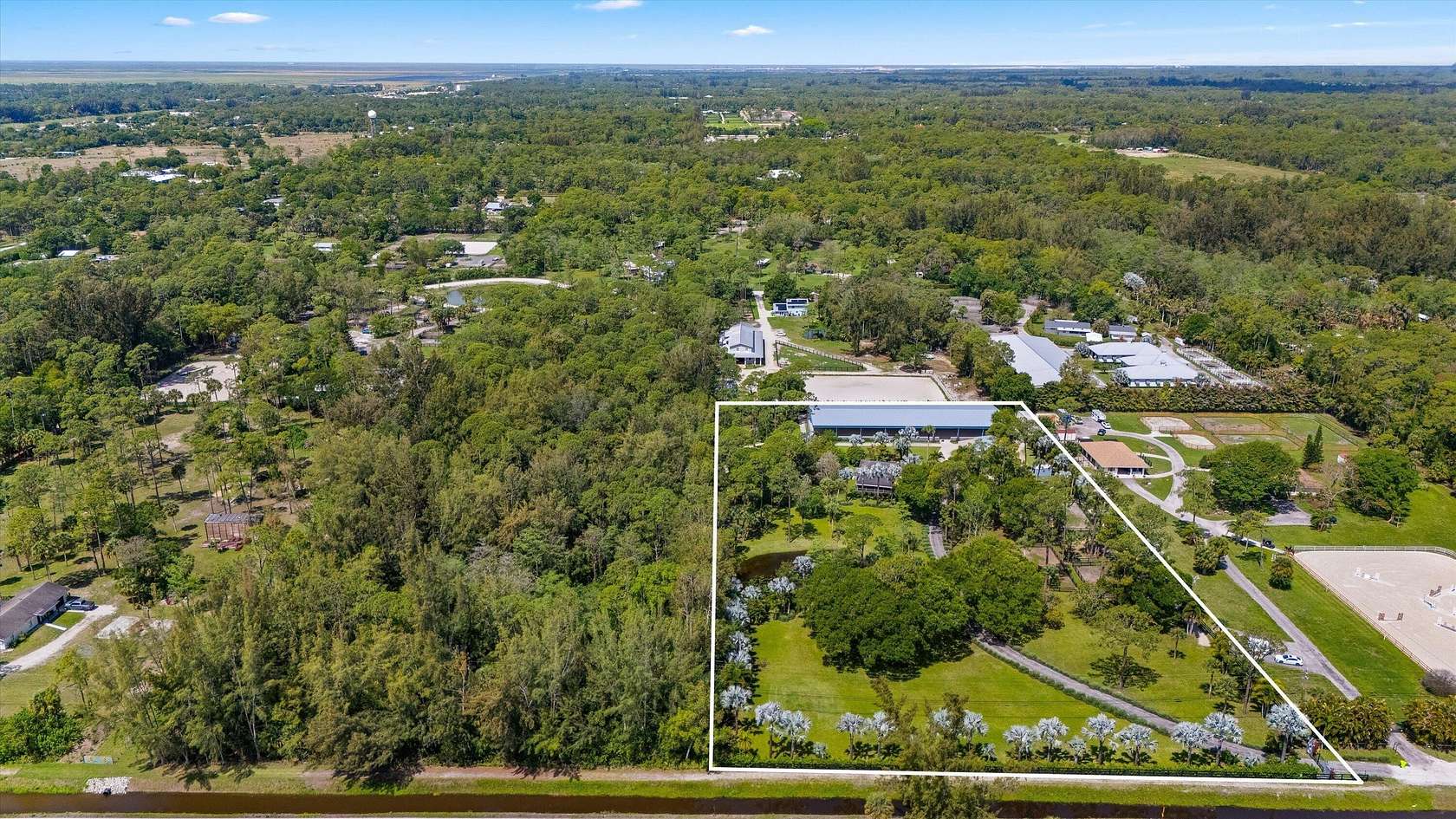 5 Acres of Land with Home for Sale in Loxahatchee Groves, Florida