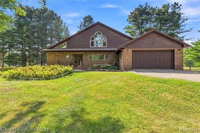 2 Acres of Land with Home for Sale in Hamburg Township, Michigan