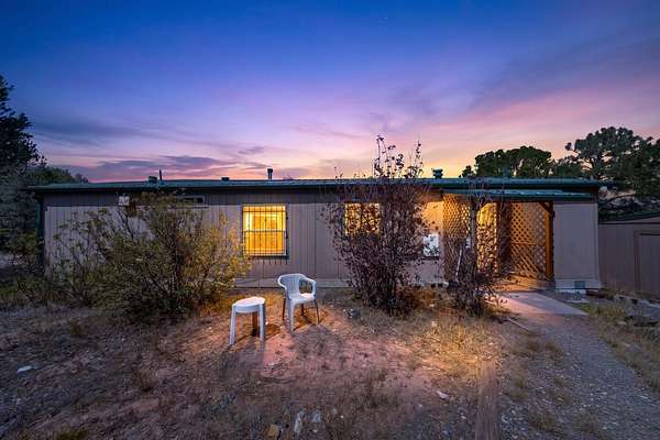4.83 Acres of Land with Home for Sale in Sandia Park, New Mexico