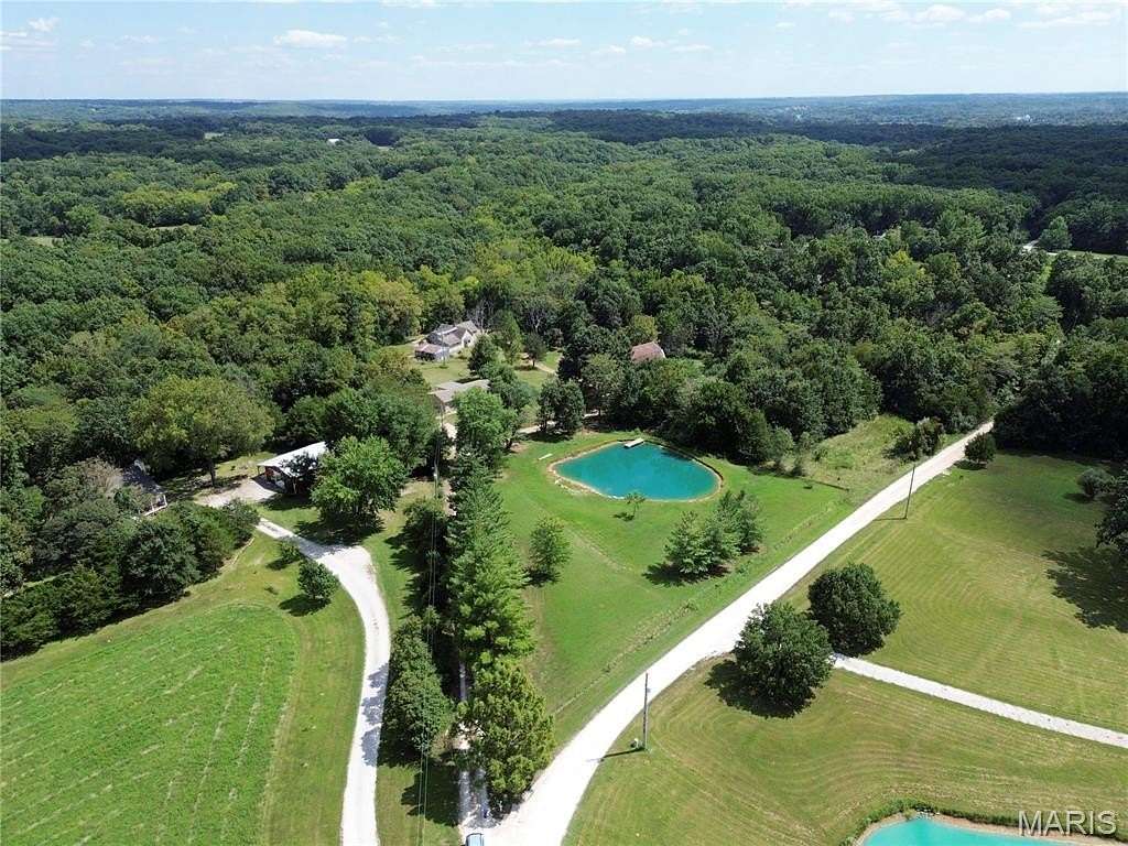 6.85 Acres of Land with Home for Sale in Troy, Missouri