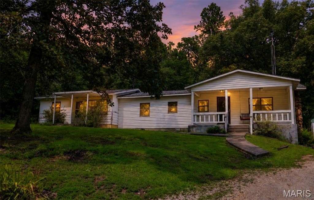 17.7 Acres of Land with Home for Sale in Patton, Missouri