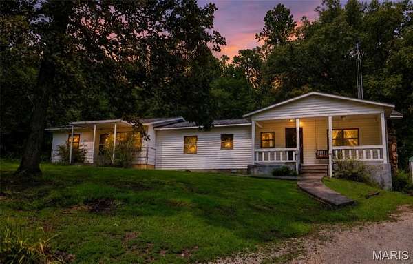 17.7 Acres of Land with Home for Sale in Patton, Missouri