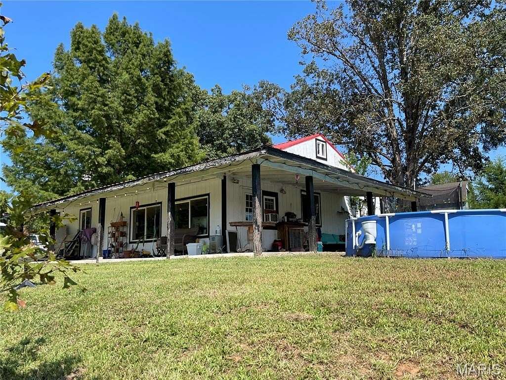 7 Acres of Land with Home for Sale in Patterson, Missouri