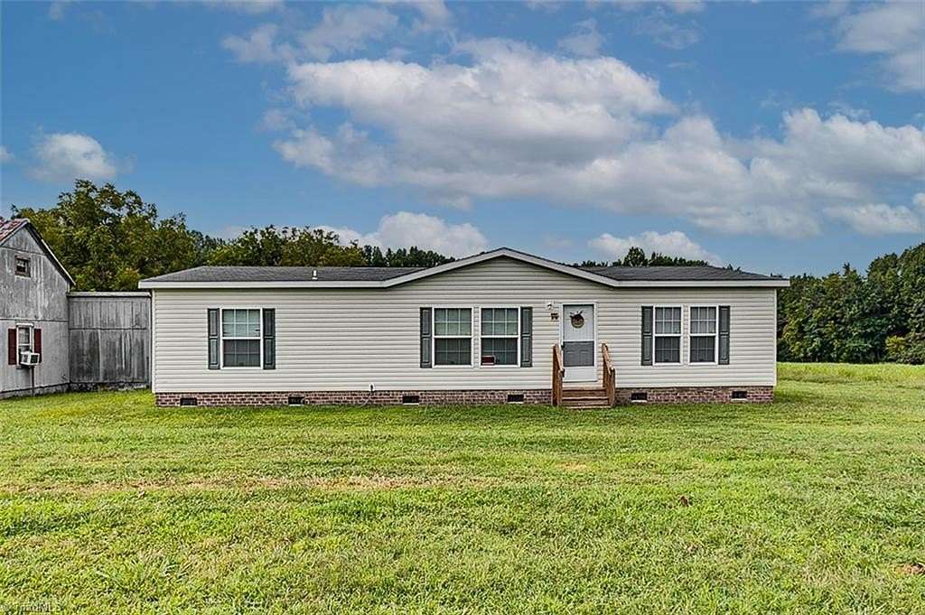 5 Acres of Land with Home for Sale in Staley, North Carolina