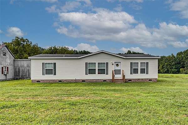 5 Acres of Land with Home for Sale in Staley, North Carolina
