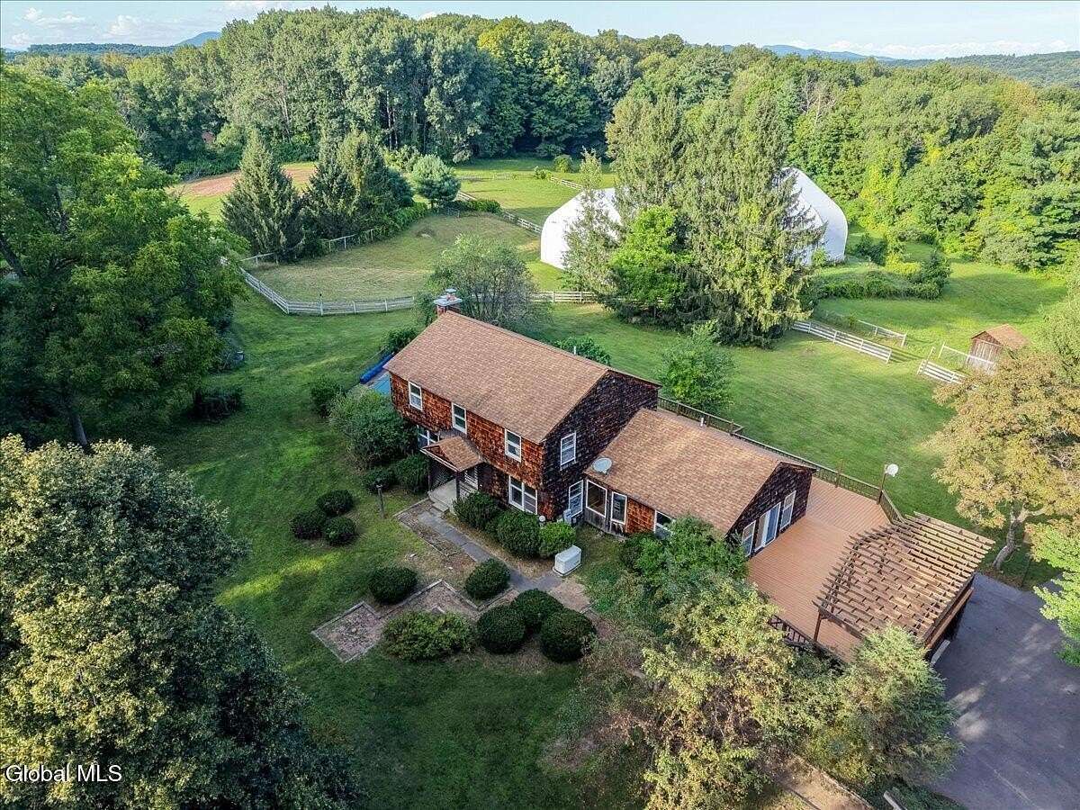 9.37 Acres of Land with Home for Sale in Queensbury, New York