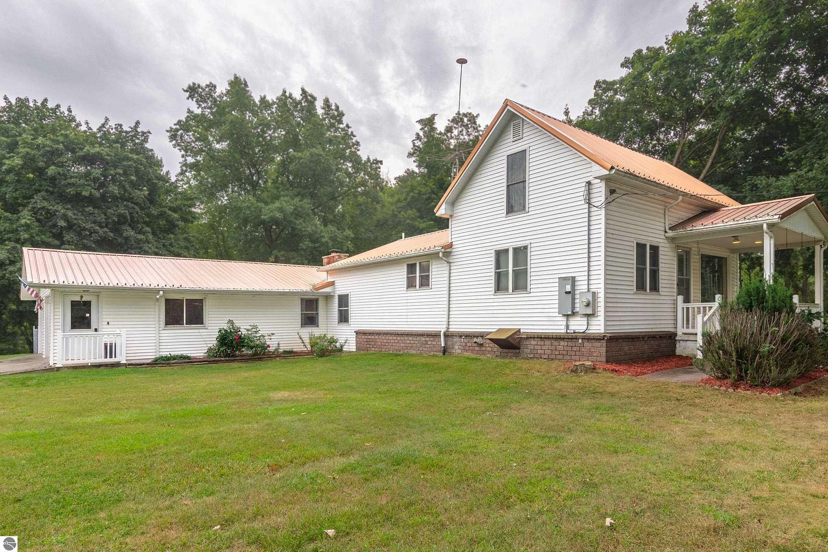 11.9 Acres of Recreational Land with Home for Sale in Riverdale, Michigan