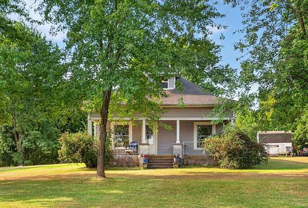 3.9 Acres of Land with Home for Sale in Stockton, Missouri