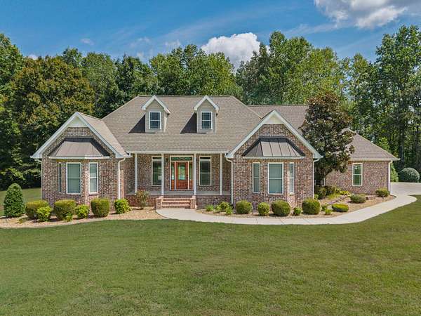 10.5 Acres of Land with Home for Sale in Lynchburg, Tennessee