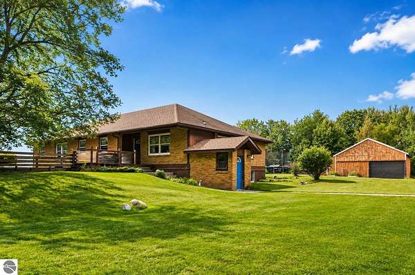 4 Acres of Land with Home for Sale in Tustin, Michigan
