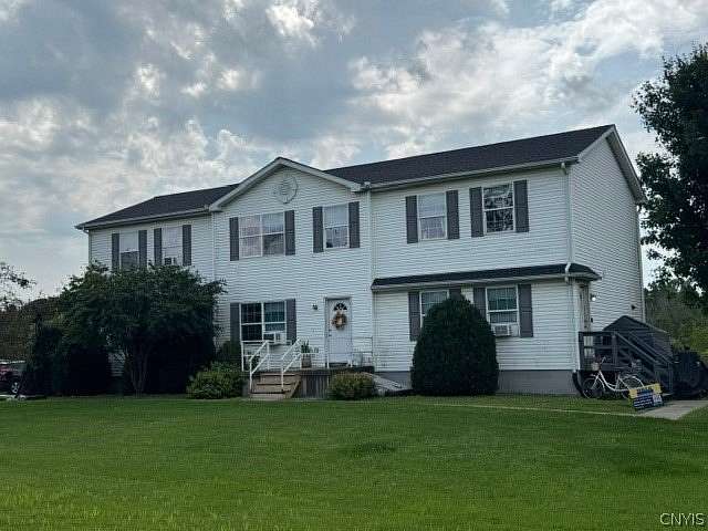 2.55 Acres of Land with Home for Sale in Lansing, New York