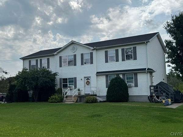 2.55 Acres of Land with Home for Sale in Lansing, New York