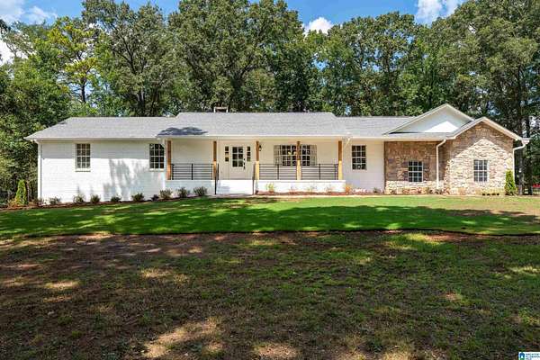 6.7 Acres of Land with Home for Sale in McCalla, Alabama