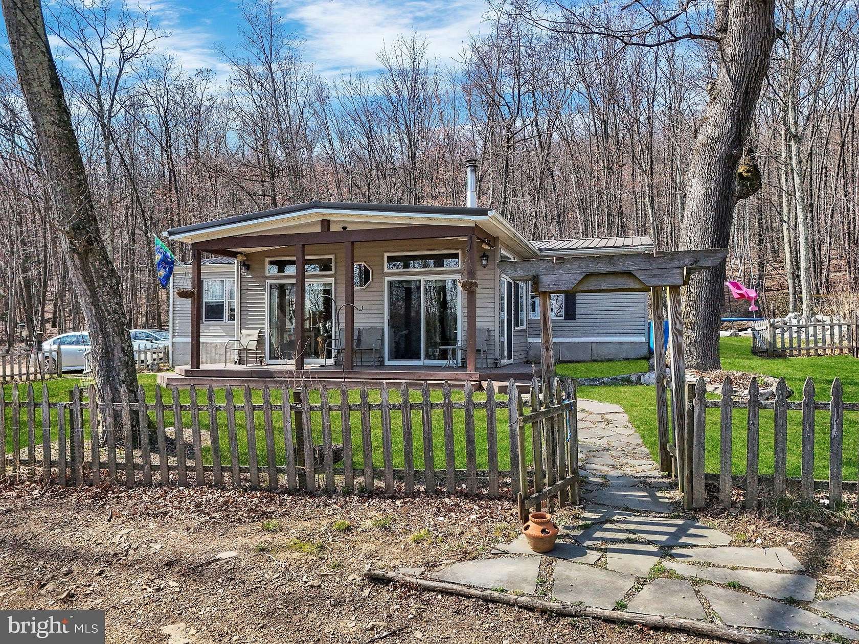 11 Acres of Land with Home for Sale in Great Cacapon, West Virginia