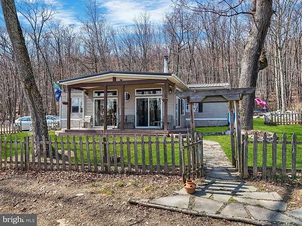 11 Acres of Land with Home for Sale in Great Cacapon, West Virginia