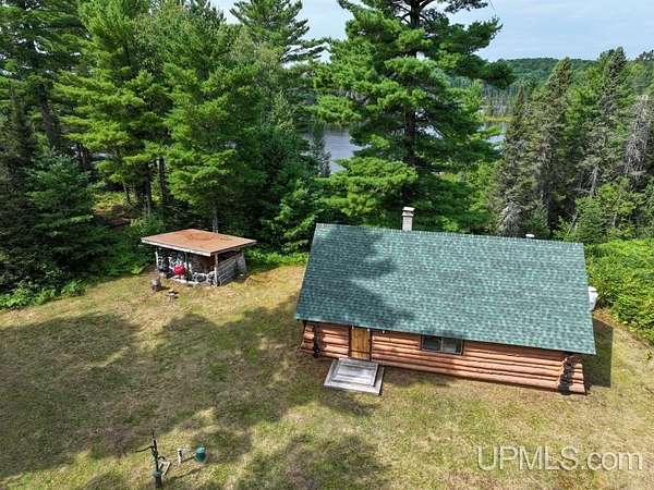 240 Acres of Recreational Land with Home for Sale in Iron River Township, Michigan