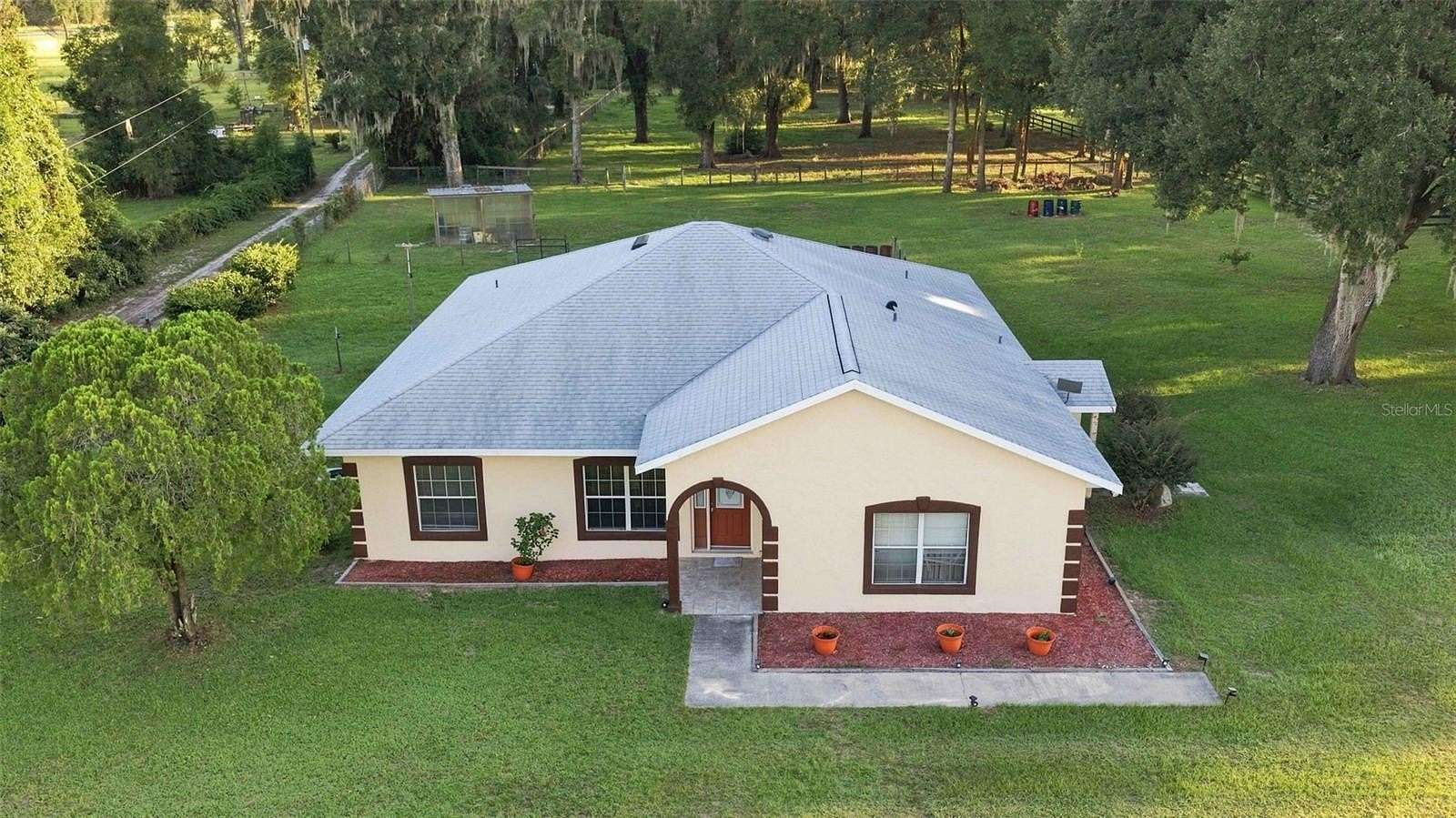 4.33 Acres of Land with Home for Sale in Citra, Florida