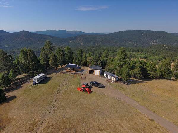 20 Acres of Recreational Land with Home for Sale in Helmville, Montana