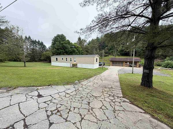 6.6 Acres of Land with Home for Sale in Kerens, West Virginia