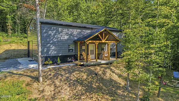 21.4 Acres of Recreational Land with Home for Sale in Dandridge, Tennessee