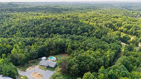 6.45 Acres of Land with Home for Sale in Benton, Arkansas