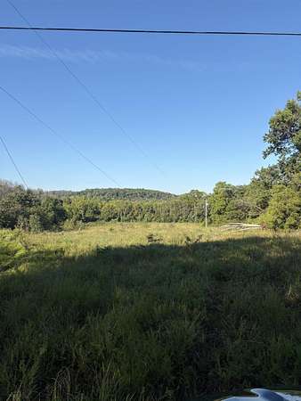 50 Acres of Recreational Land with Home for Sale in Melbourne, Arkansas