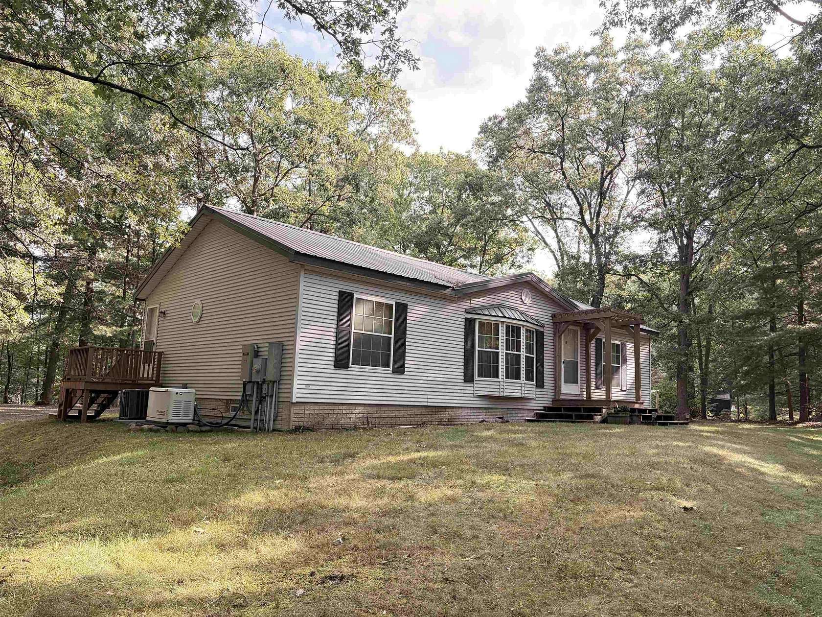 3.3 Acres of Land with Home for Sale in Harrison, Michigan