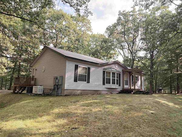 3.3 Acres of Land with Home for Sale in Harrison, Michigan