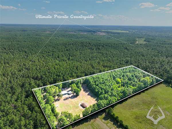 7.67 Acres of Land with Home for Sale in Colmesneil, Texas