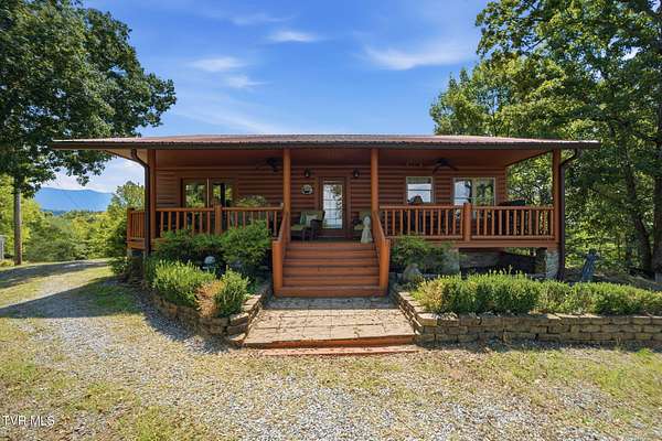 10.6 Acres of Land with Home for Sale in Dandridge, Tennessee