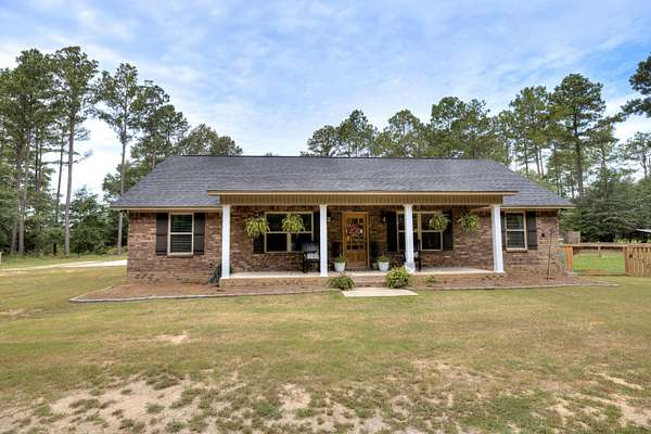 8.64 Acres of Land with Home for Sale in Dalzell, South Carolina