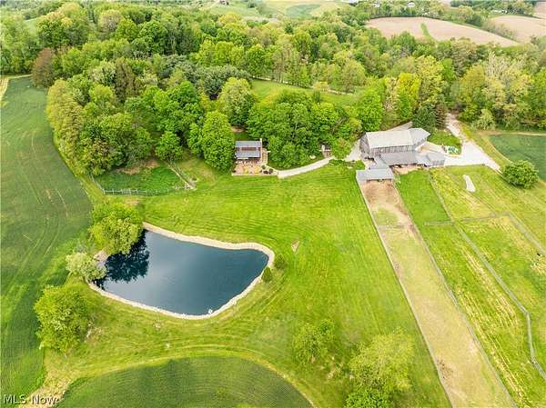 11 Acres of Recreational Land with Home for Auction in Fresno, Ohio
