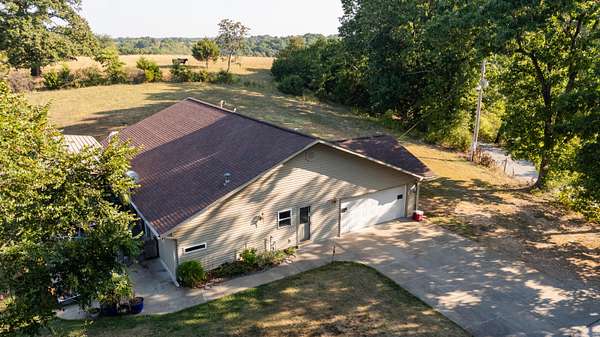 4.3 Acres of Land with Home for Sale in Cape Fair, Missouri