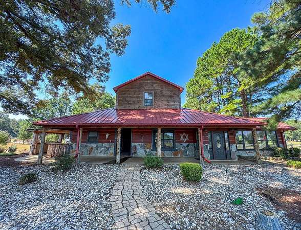 13.2 Acres of Land with Home for Sale in Jefferson, Texas