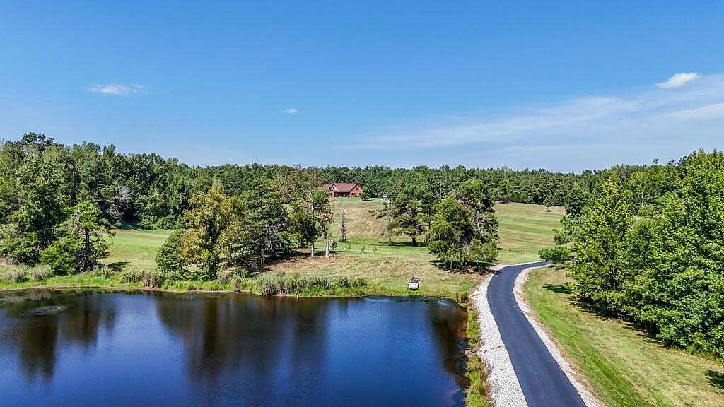 49.7 Acres of Recreational Land with Home for Sale in Sardis, Mississippi