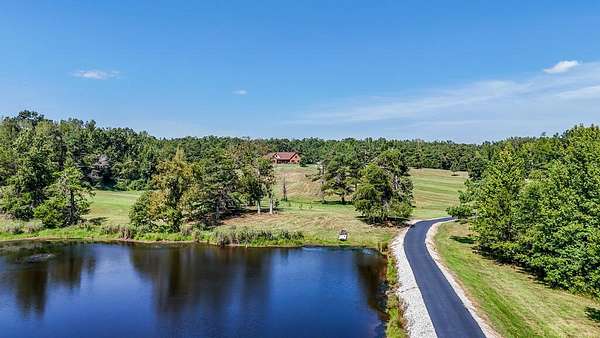 49.7 Acres of Recreational Land with Home for Sale in Sardis, Mississippi