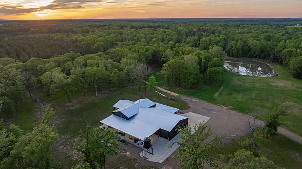 185 Acres of Recreational Land with Home for Sale in Simms, Texas