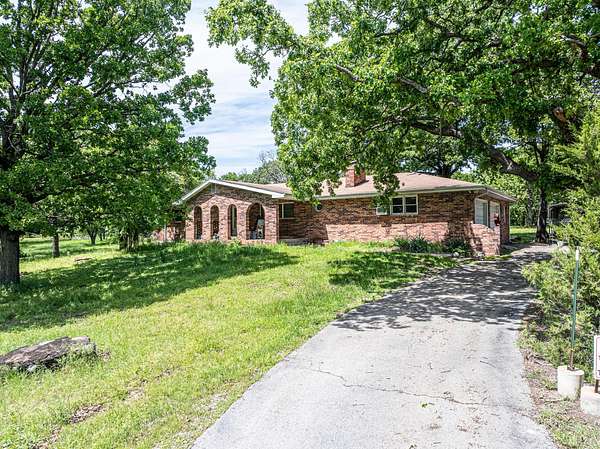 18.9 Acres of Land with Home for Sale in El Dorado Springs, Missouri