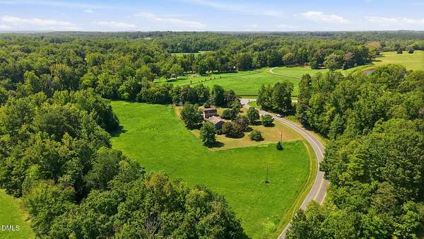 6.69 Acres of Land with Home for Sale in Rougemont, North Carolina