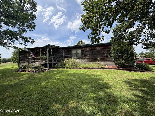 5 Acres of Land with Home for Sale in Grove, Oklahoma