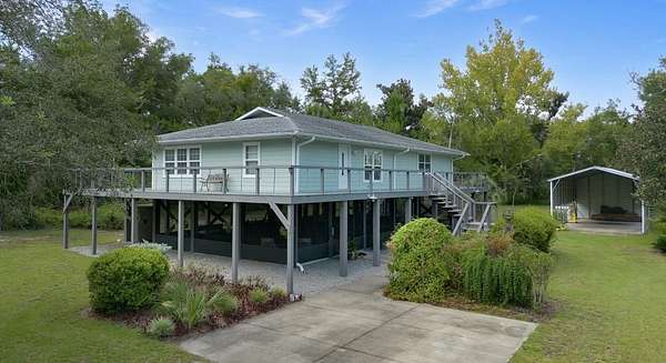 26.8 Acres of Land with Home for Sale in Perry, Florida