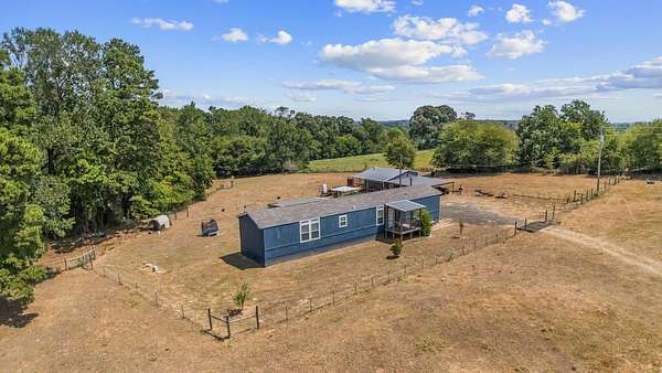9.8 Acres of Land with Home for Sale in Nacogdoches, Texas
