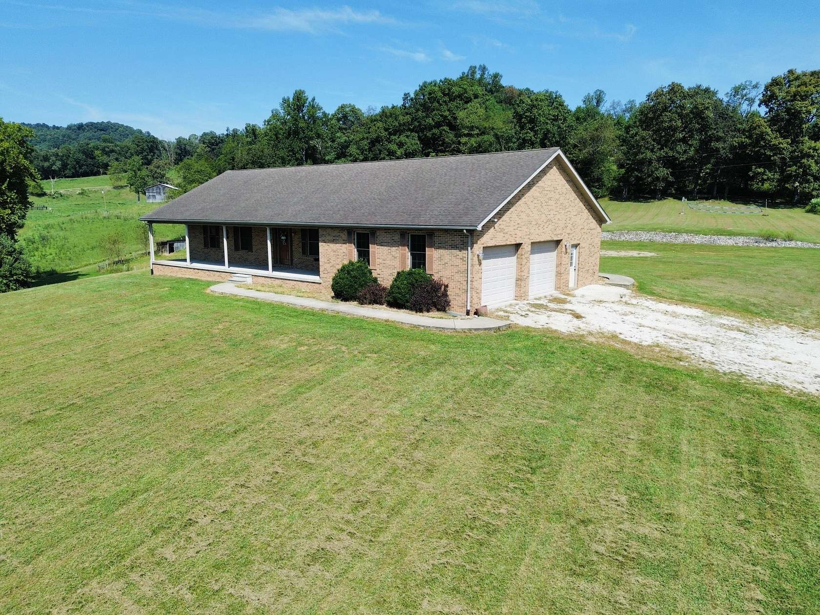 10.6 Acres of Land with Home for Sale in Vanceburg, Kentucky