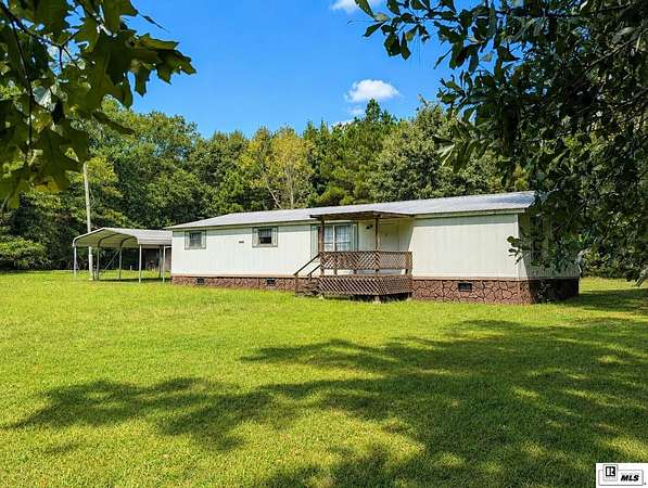 10 Acres of Land with Home for Sale in Bastrop, Louisiana