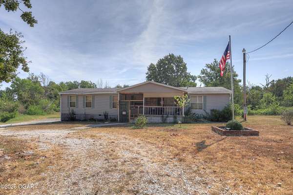5 Acres of Land with Home for Sale in Anderson, Missouri