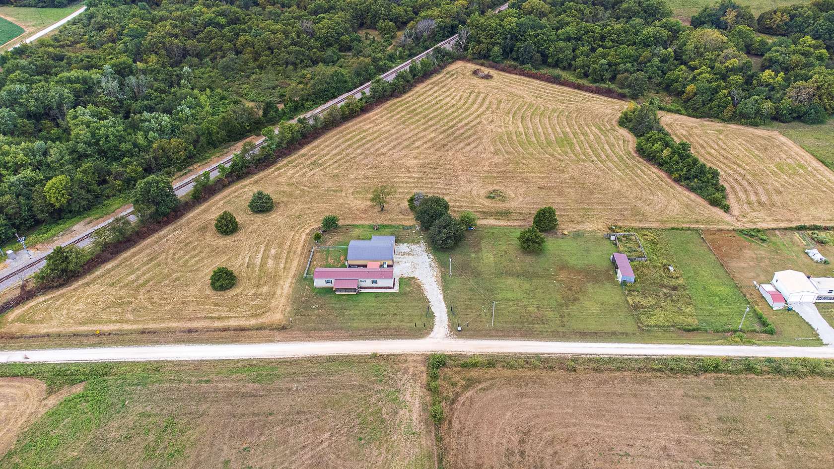 16 Acres of Recreational Land with Home for Sale in Lamar, Missouri