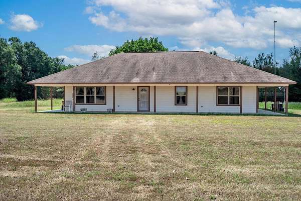 2 Acres of Land with Home for Sale in Pittsburg, Texas
